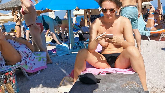 Legs spread topless bikini 